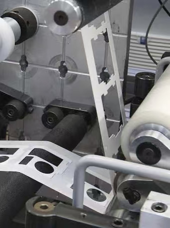 High-speed multi-station continuous rotary die-cutting lines converting precision foam gaskets and adhesive tapes.
